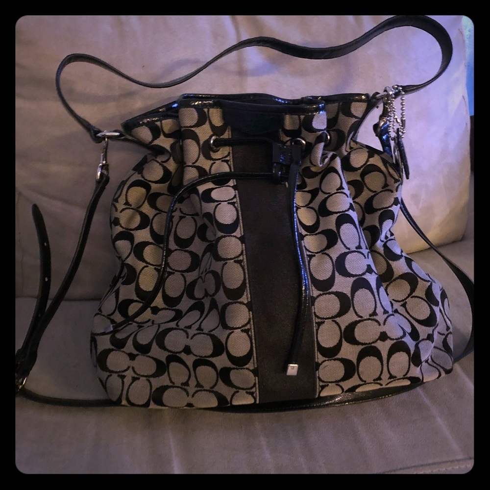 Beautiful drawstring coach purse never worn